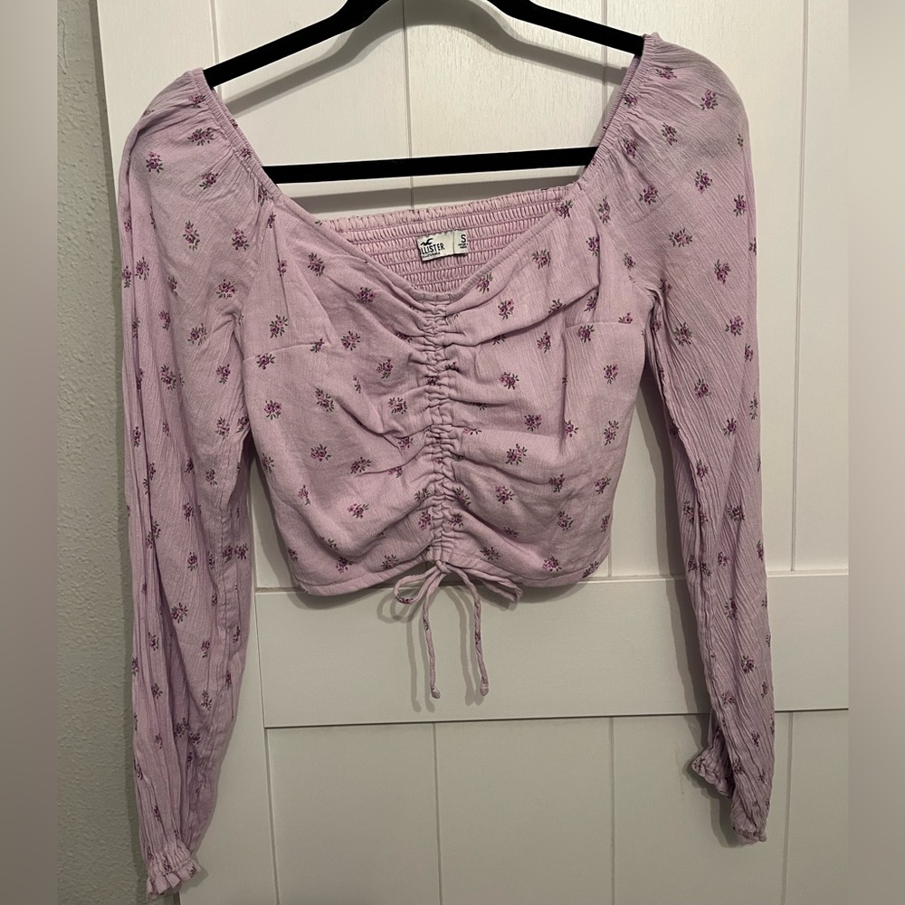 Lavender cropped style blouse with violet floral design pattern throughout